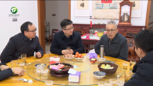 何毅看望慰问张荣桥院士