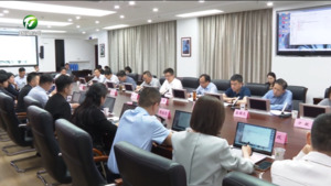 何毅与董效飞一行举行工作会谈