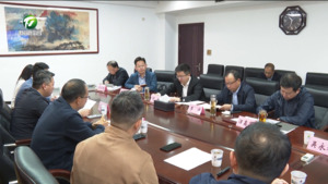 何毅与相锋一行举行工作会谈