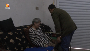 周海柱:十五年如一日 照顾病妻不言弃